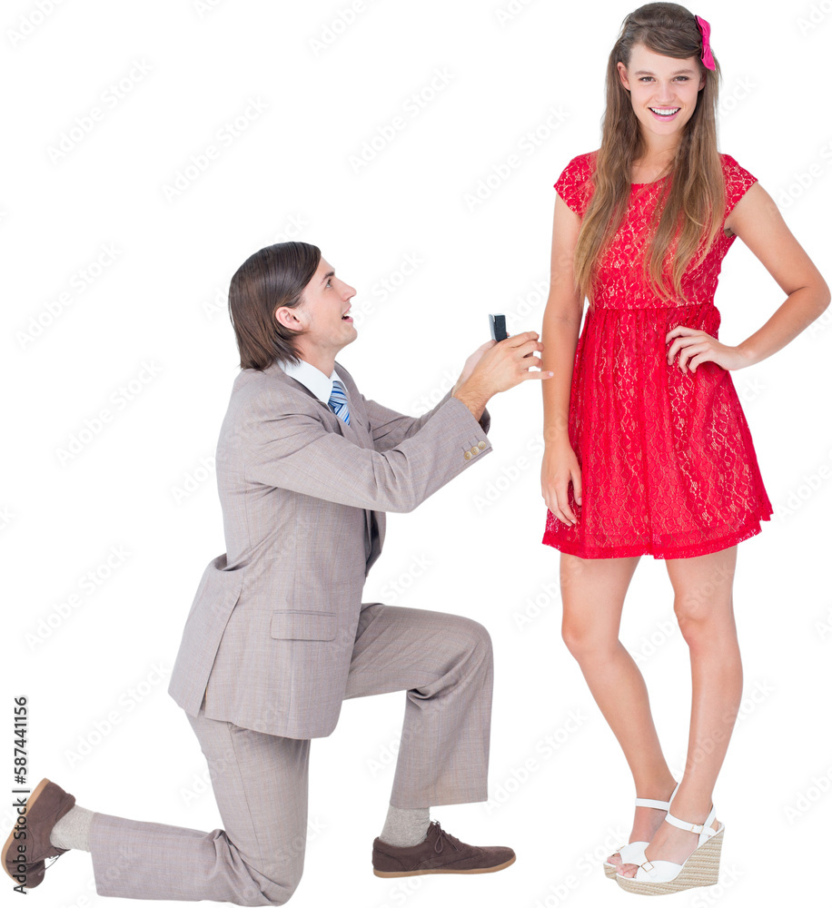 Hipster on bended knee doing a marriage proposal to his girlfriend Hipster on bended knee doing a marriage proposal to his girlfriend