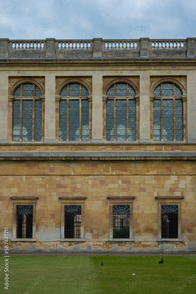 Medieval architecture and historical windows of Nevile's Court at Trinity College in Cambridge