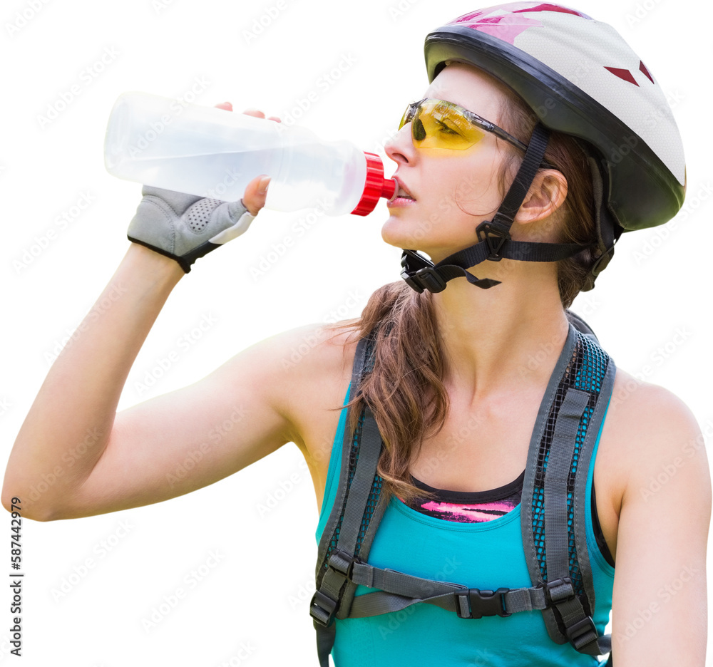 Fototapeta premium Young mountain biker drinking water 