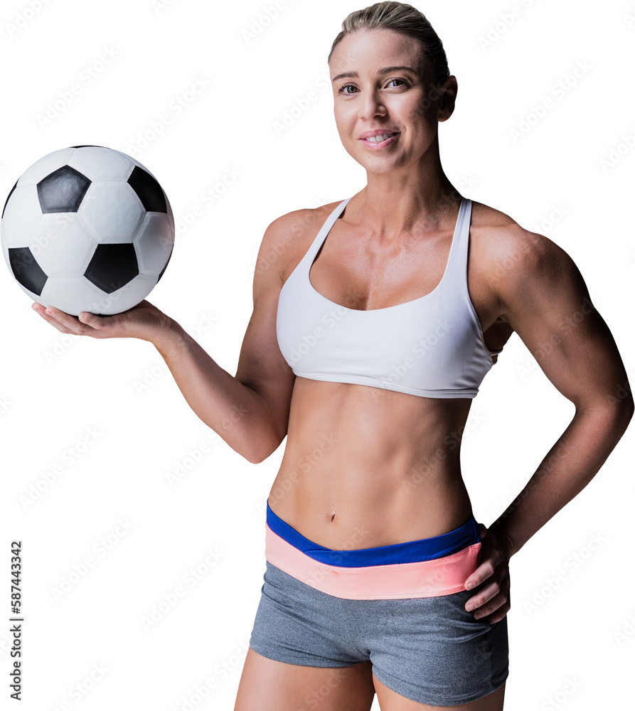 Female athlete holding a soccer ball Female athlete holding a soccer ball