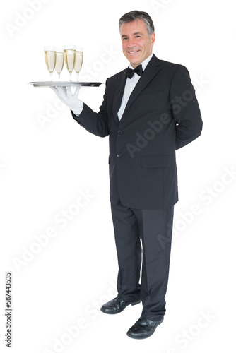 Waiter standing with tray of champagne