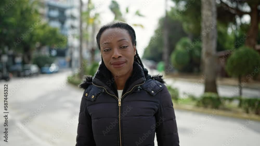African american woman smiling confident standing at street African american woman smiling confident standing at street