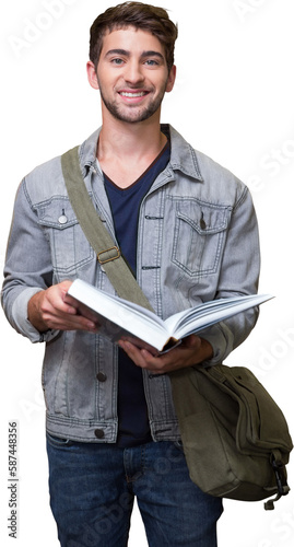 Student smiling at camera in library