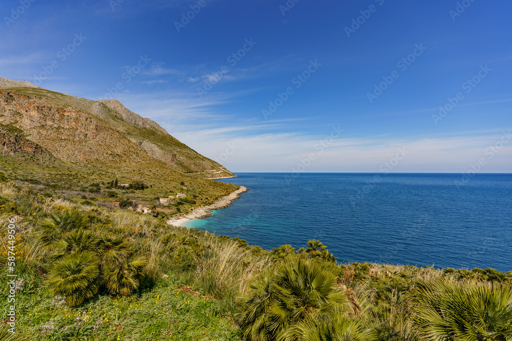 View of the beautiful blue sea falling between the mountain shores. View of the beautiful blue sea falling between the mountain shores.