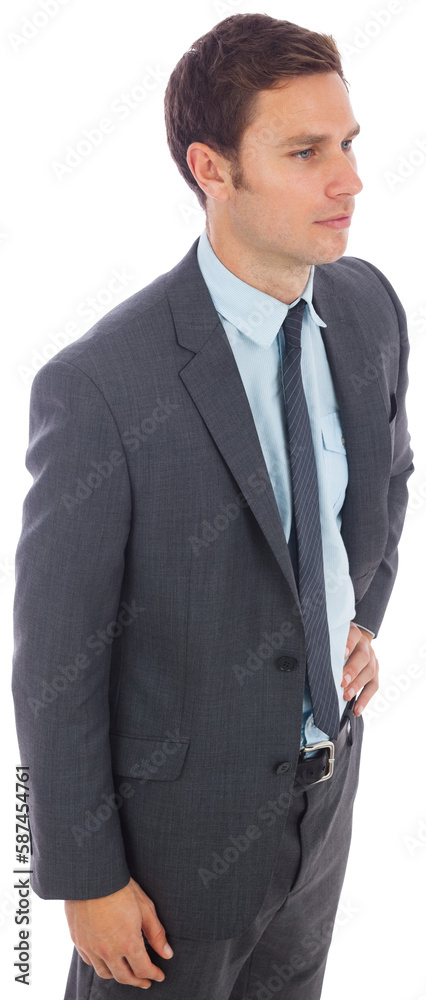 Serious businessman standing with hand on hip Serious businessman standing with hand on hip