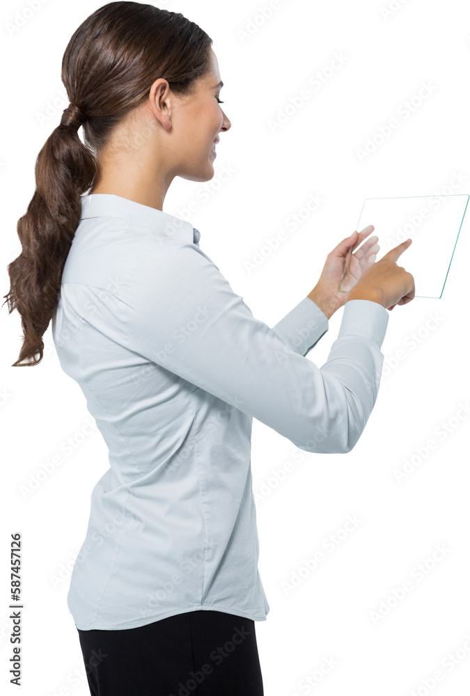 Smiling young female executive using glass tablet computer Smiling young female executive using glass tablet computer