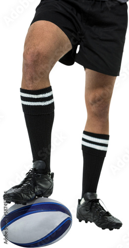 Sports player in black socks on ball