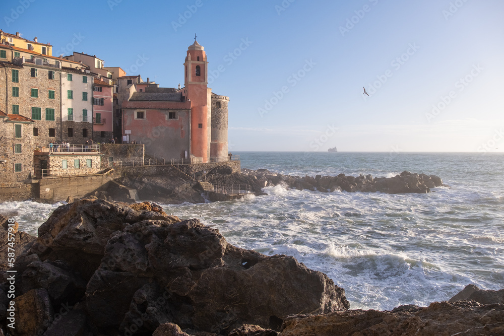 Sea waves breaking on Tellaro, ancient and small village near Lerici Sea waves breaking on Tellaro, ancient and small village near Lerici