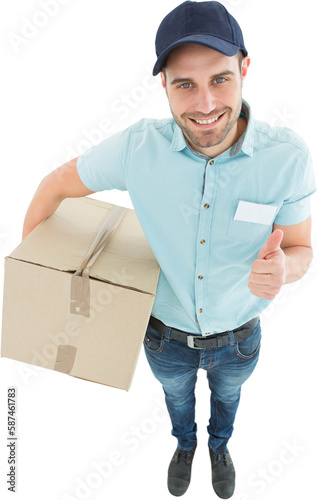 Delivery man with cardboard box gesturing thumbs up