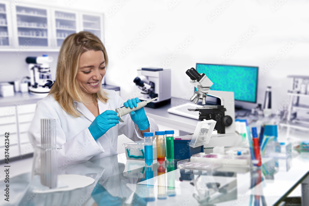 A Caucasian female scientist is working energetically in a scientific research facility. She is wearing a white lab coat and protective gloves. A Caucasian female scientist is working energetically in a scientific research facility. She is wearing a white lab coat and protective gloves.