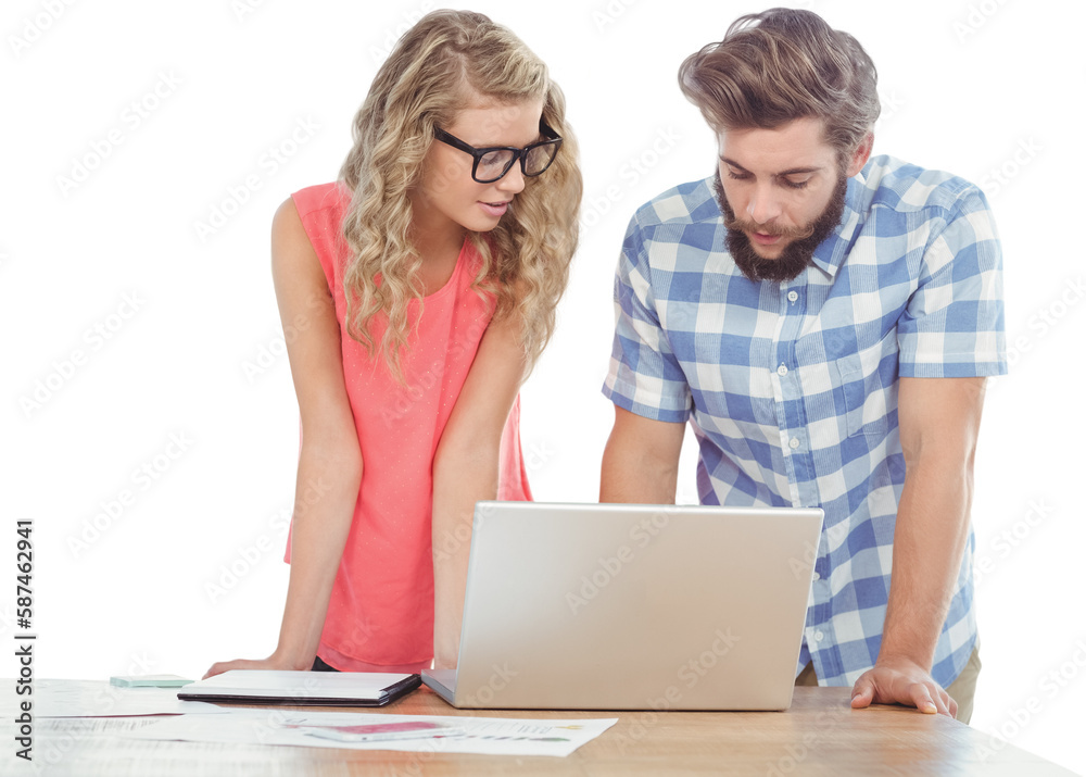 Man using laptop while discussing with woman at desk Man using laptop while discussing with woman at desk
