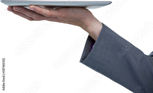 Cropped hand of businessman holding tablet pc