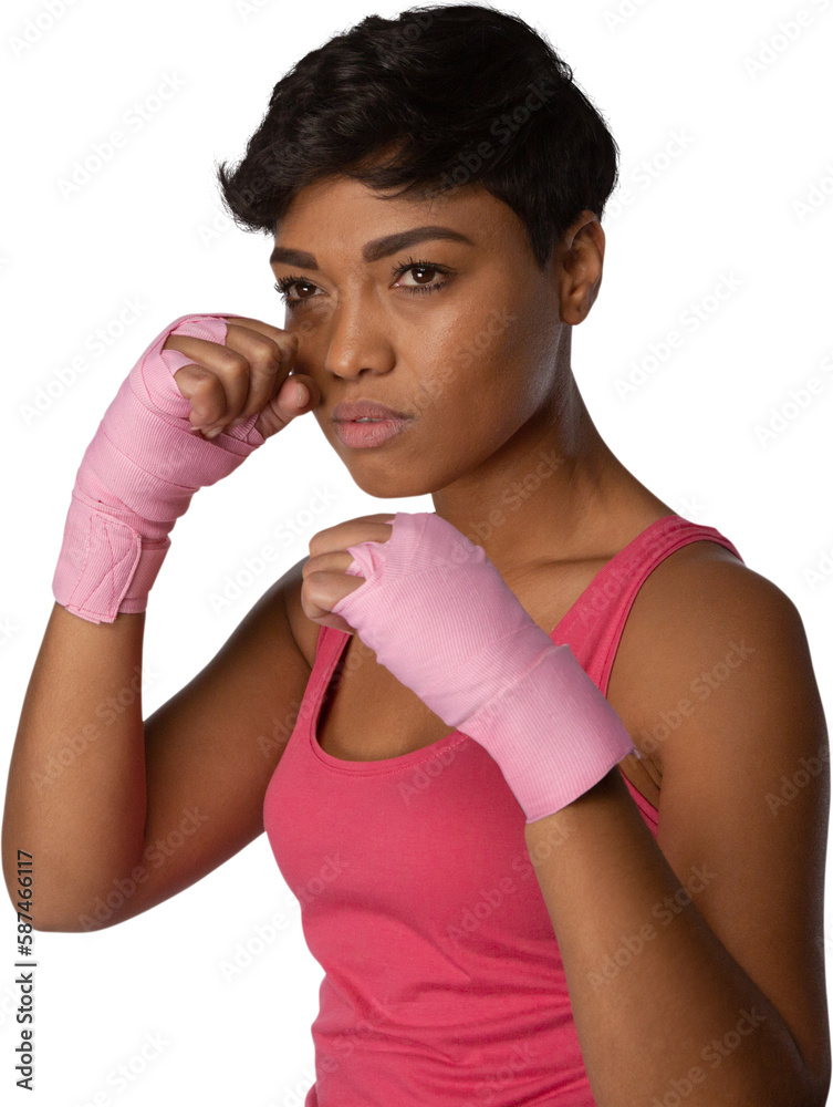 Woman standing for breast cancer awareness against white background
