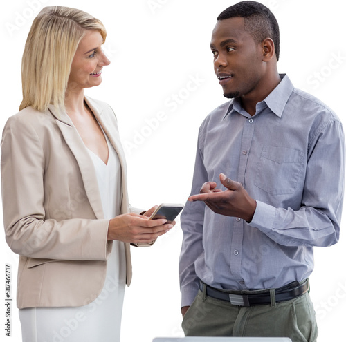 Smiling businesswoman and businessman are conversing 