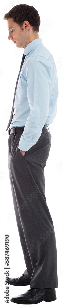 Serious businessman standing with hands in pockets Serious businessman standing with hands in pockets