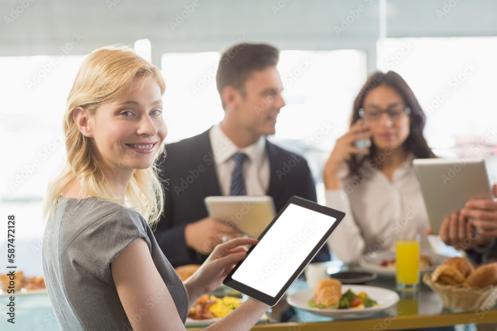 Businesswoman holding digital tablet Businesswoman holding digital tablet