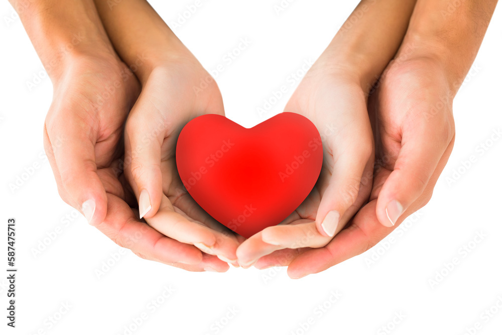Couple holding miniature heart in hands