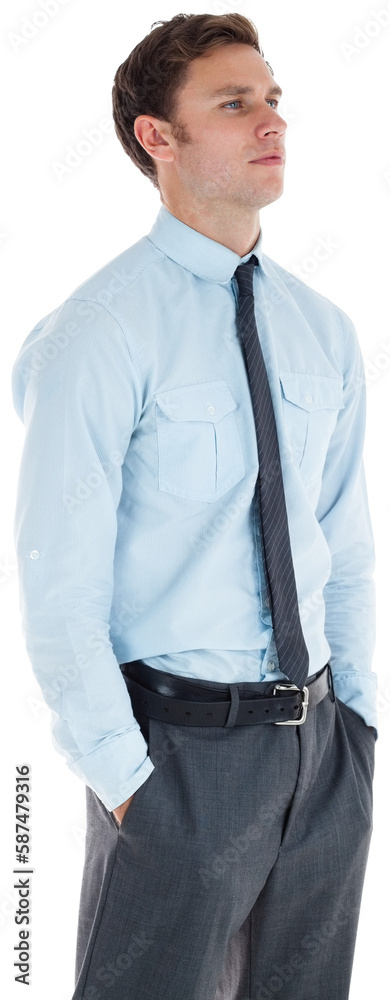 Serious businessman standing with hands in pockets Serious businessman standing with hands in pockets