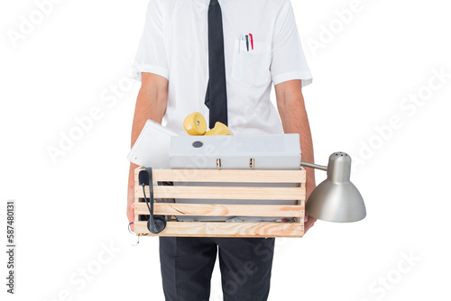 Fired businessman holding box of belongings 