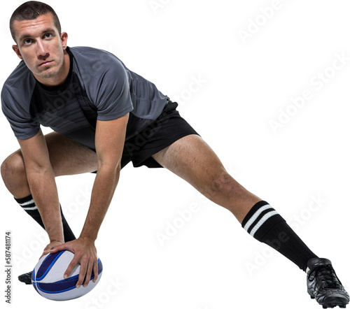Sports player in black jersey stretching with ball