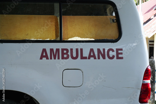 Close-up of side of white ambulance to transport sick or deceased patients