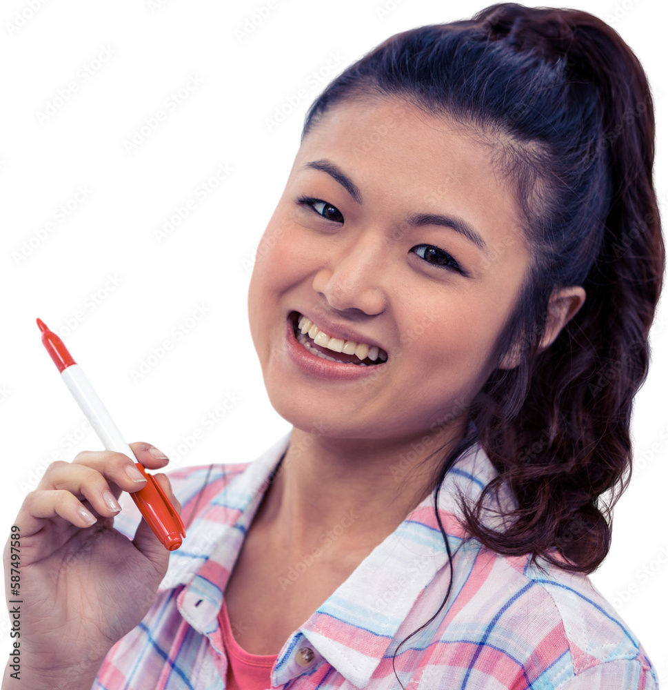 Smiling woman against wooden wall with notes on it Smiling woman against wooden wall with notes on it