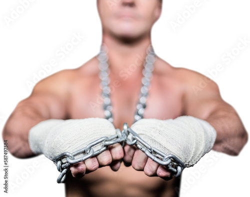 Midsection of shirtless man wearing bandage and chain