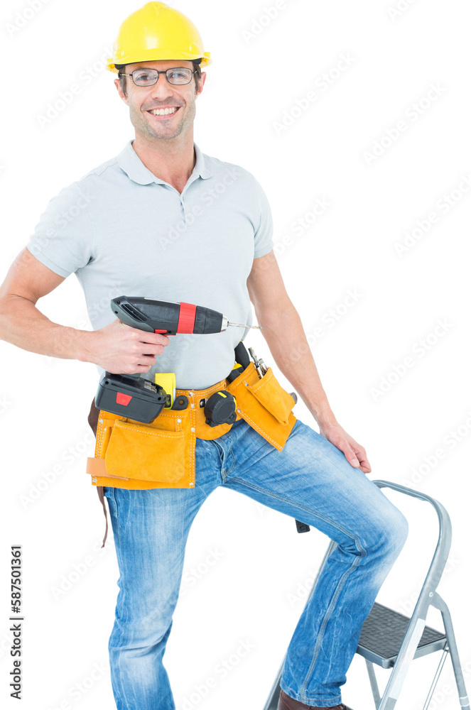 Worker holding drill machine on step ladder Worker holding drill machine on step ladder