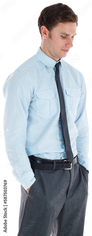 Serious businessman standing with hands in pockets Serious businessman standing with hands in pockets