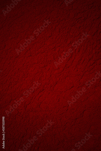 Abstract red grunge decorative stucco background. layout design. red leather texture, dark red leather material texture, useful as background for design work. red earth, red sand, red powder, powder