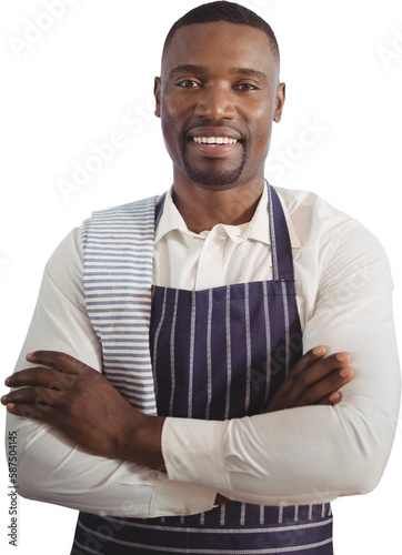 Portrait of smiling waiter with arms crossed