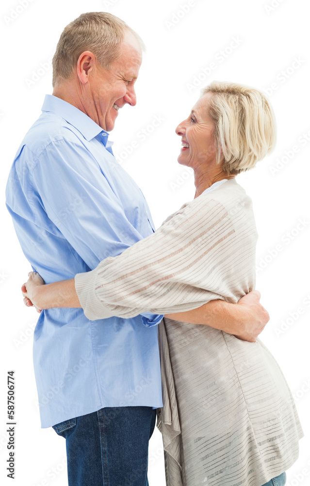 Happy mature couple hugging and smiling