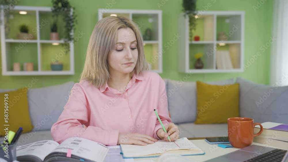 University girl with a focus problem.
University girl studying at home has trouble focusing. Something always comes to mind.
University girl with a focus problem.
University girl studying at home has trouble focusing. Something always comes to mind.