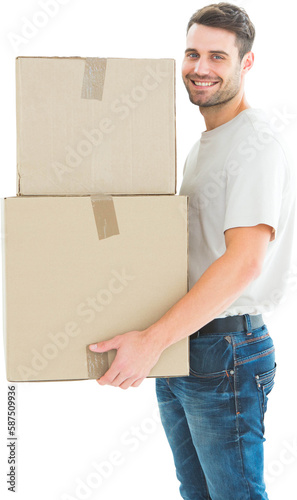 Happy delivery man carrying cardboard boxes