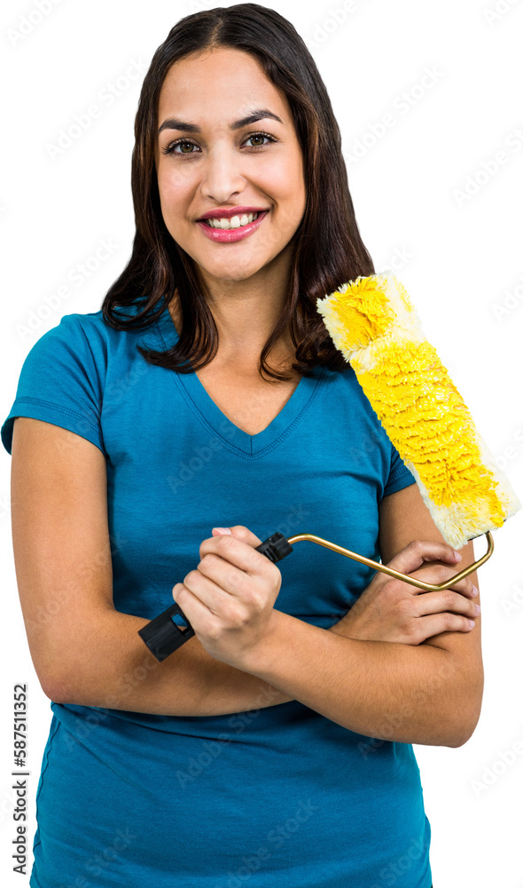 Portrait of pretty brunette holding paint roller Portrait of pretty brunette holding paint roller