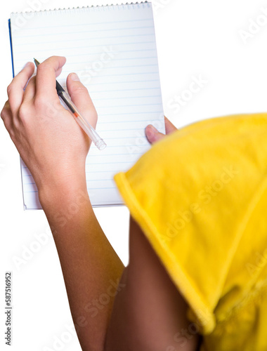 Cropped image of woman writing