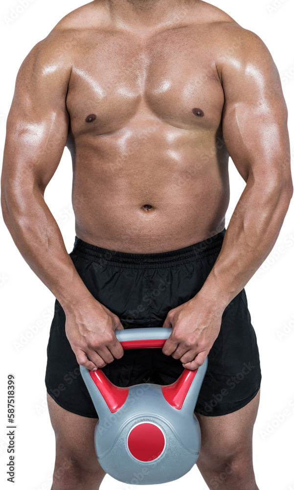 Naklejka premium Muscular man lifting heavy kettlebell 