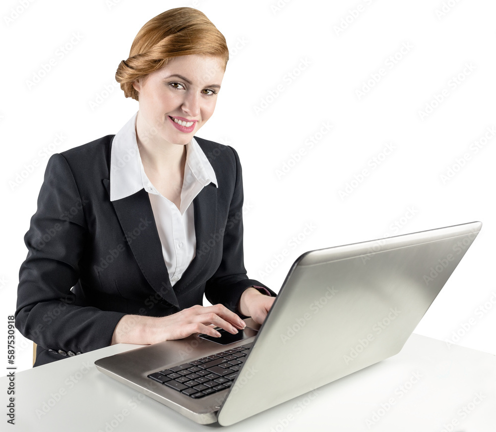 Redhead businesswoman using her laptop Redhead businesswoman using her laptop