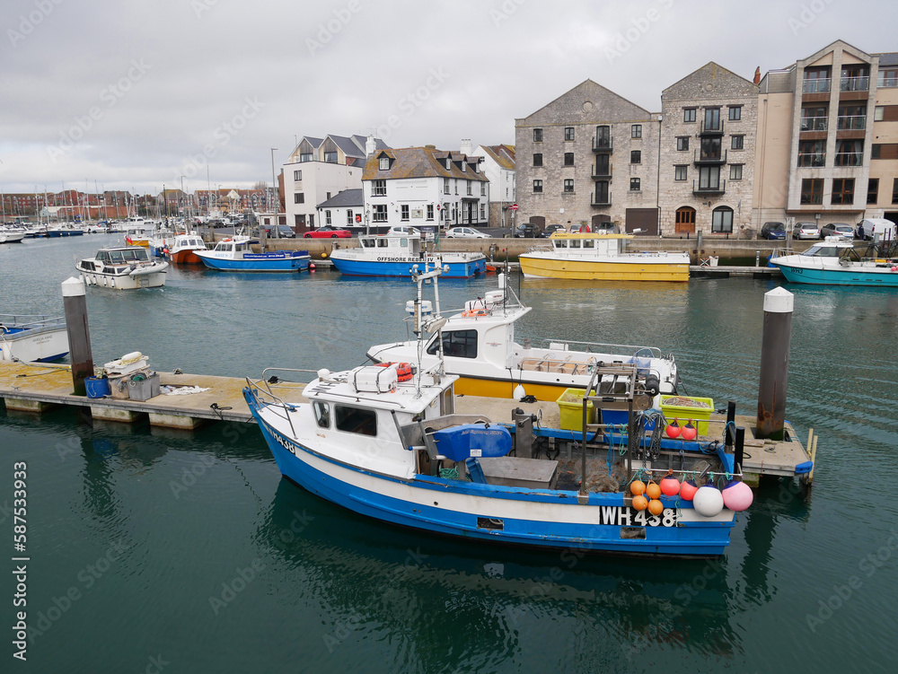Boats in the old town of Weymouth Harbour and Weymouth Marina in Dorset, England, UK