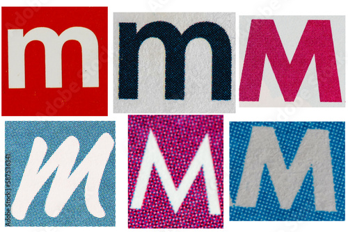 Letter font m from printout magazine cut out, collage element.
