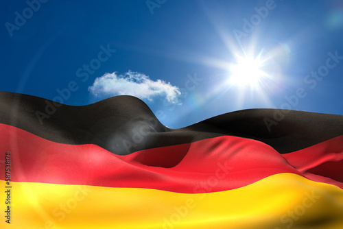 German national flag under sunny sky
