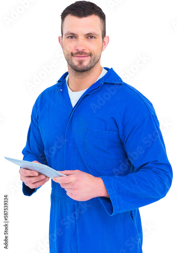 Happy mechanic pointing on digital tablet