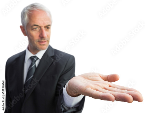 Concentrated businessman with palm up