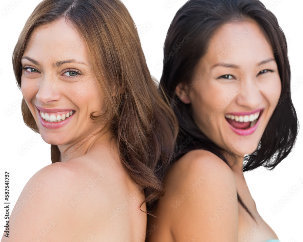 Laughing beautiful nude models posing back-to-back Laughing beautiful nude models posing back-to-back