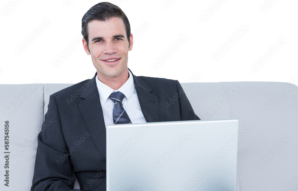 Portrait of smiling businessman using laptop Portrait of smiling businessman using laptop