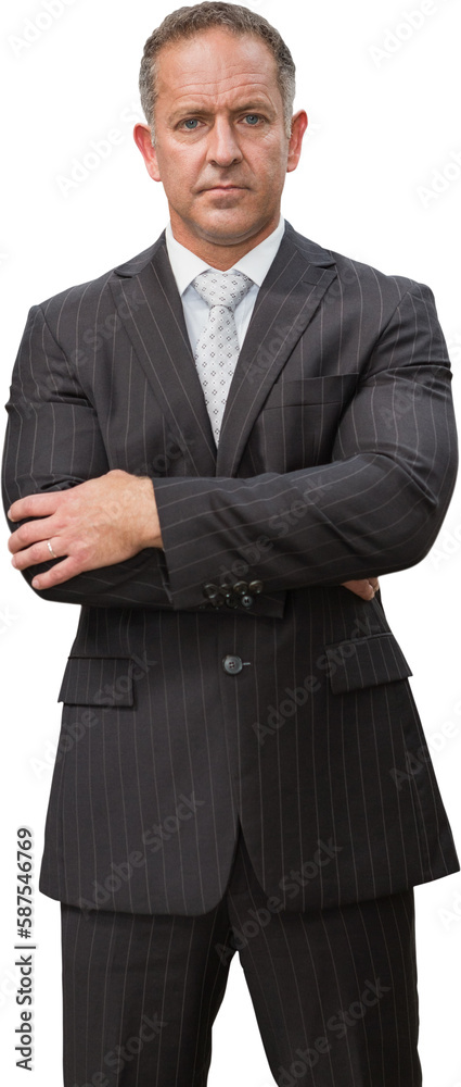 Serious manager with arms crossed in warehouse Serious manager with arms crossed in warehouse