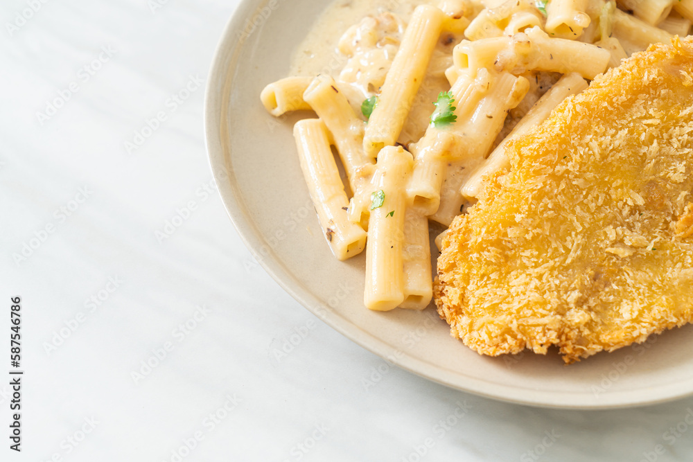 quadrotto penne pasta white cream sauce with fried fish quadrotto penne pasta white cream sauce with fried fish
