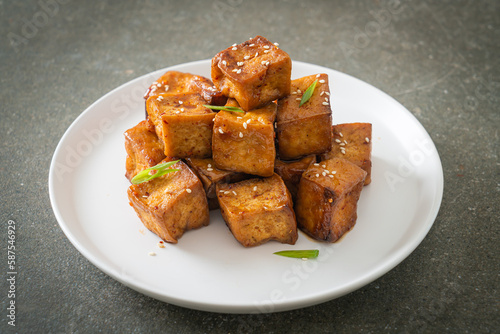 fried tofu with white sesame and teriyaki sauce