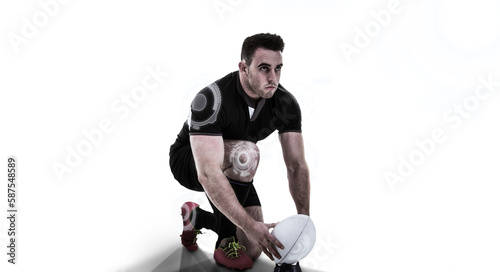 Rugby player positioning ball © vectorfusionart