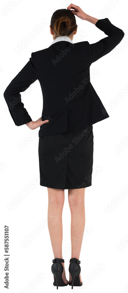 Young businesswoman standing and thinking Young businesswoman standing and thinking